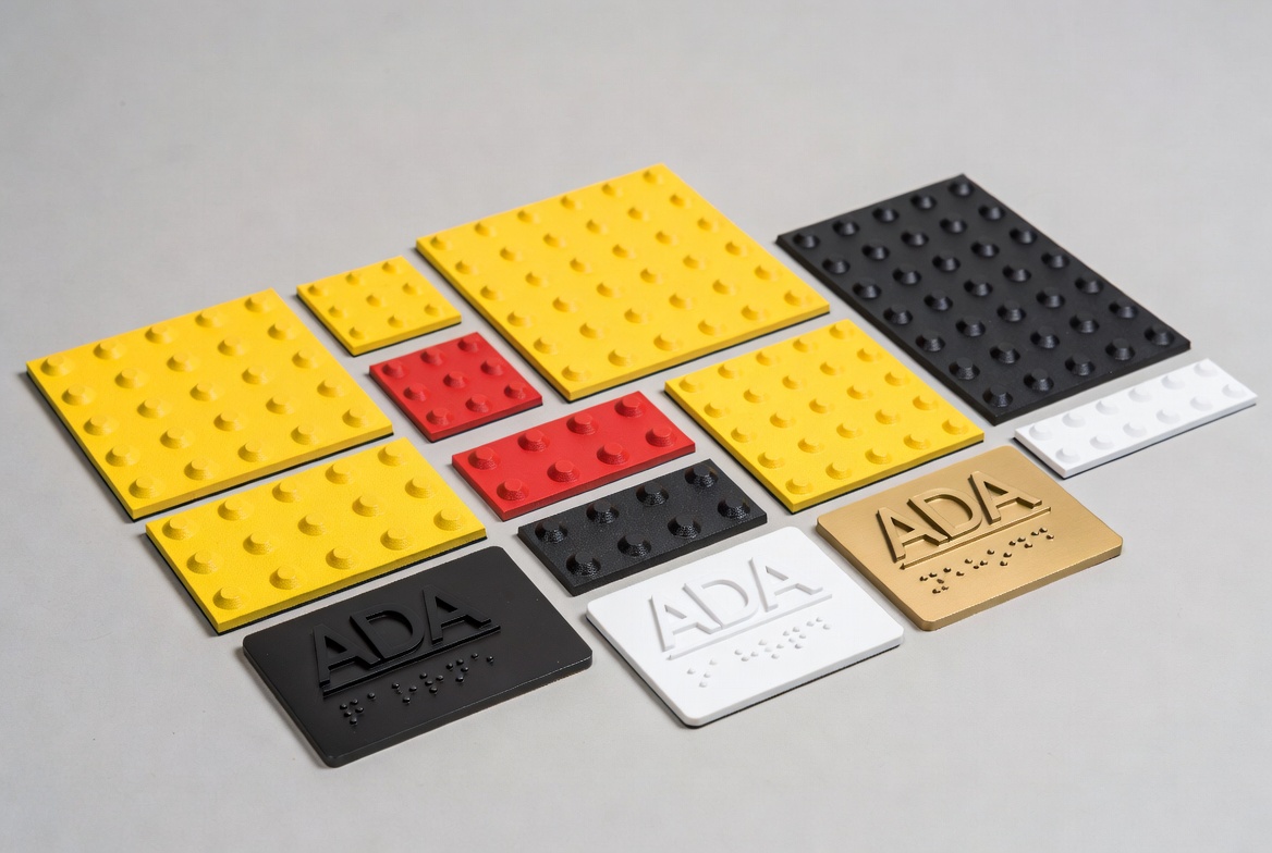 What are all these Yellow Pads with Bumps on street corners?